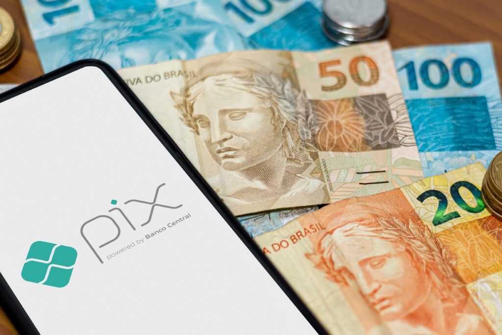 Brazil's Pix app next to cash